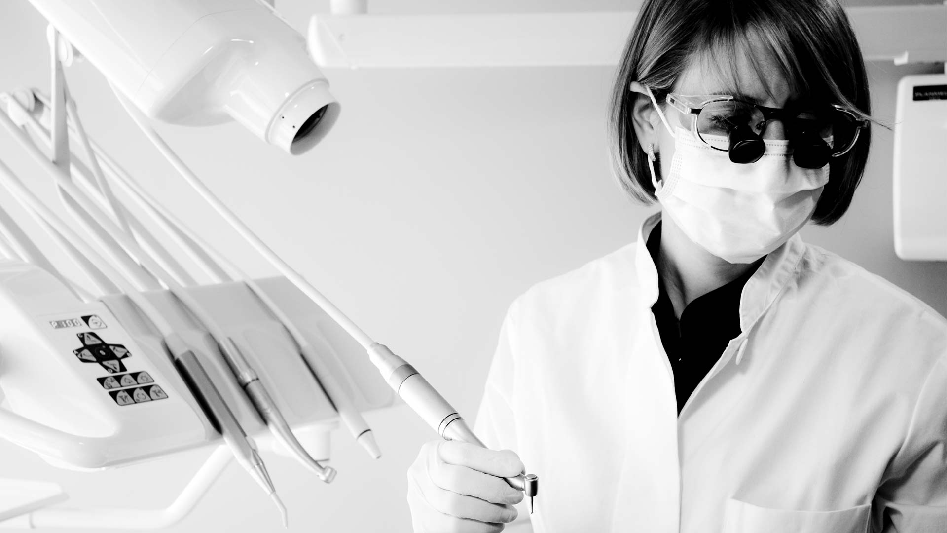 Dentist Dr Mya S. Choufani wears protective clothing ready to perform dental treatment at Clinica Cloe